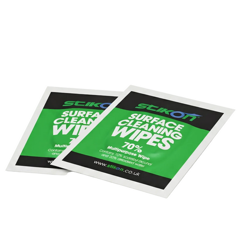Two packages of Stikoff surface cleaning wipes on a white background